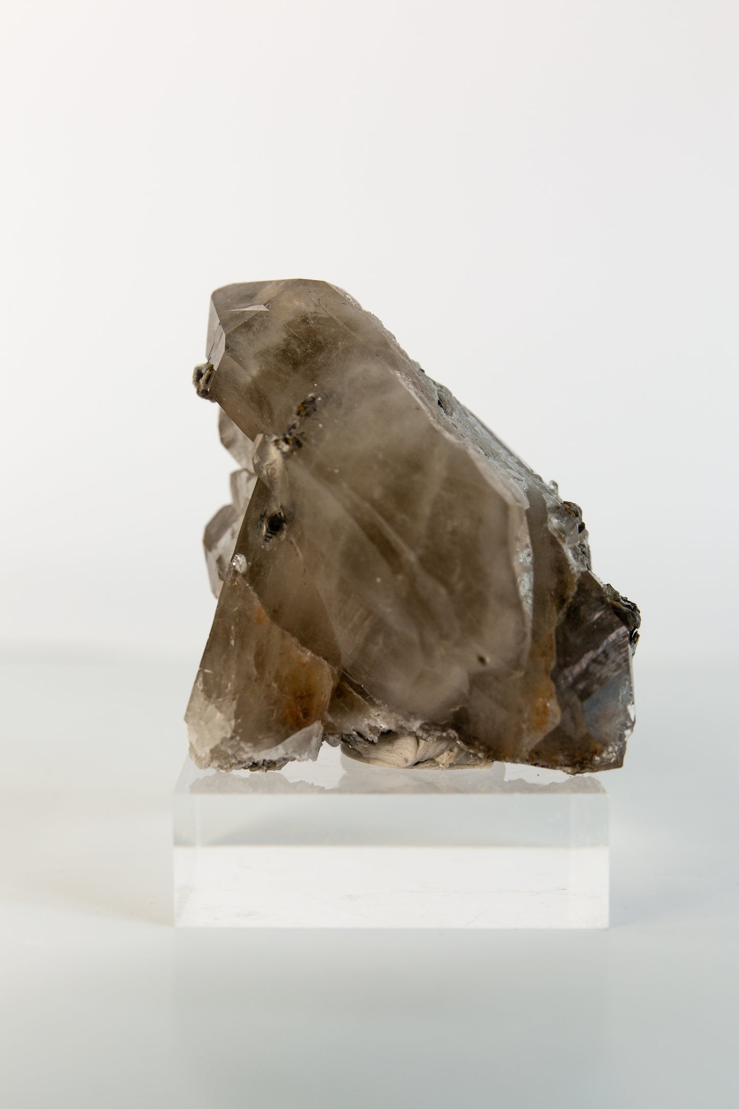 Hand dug Australian double terminated smoky with muscovite