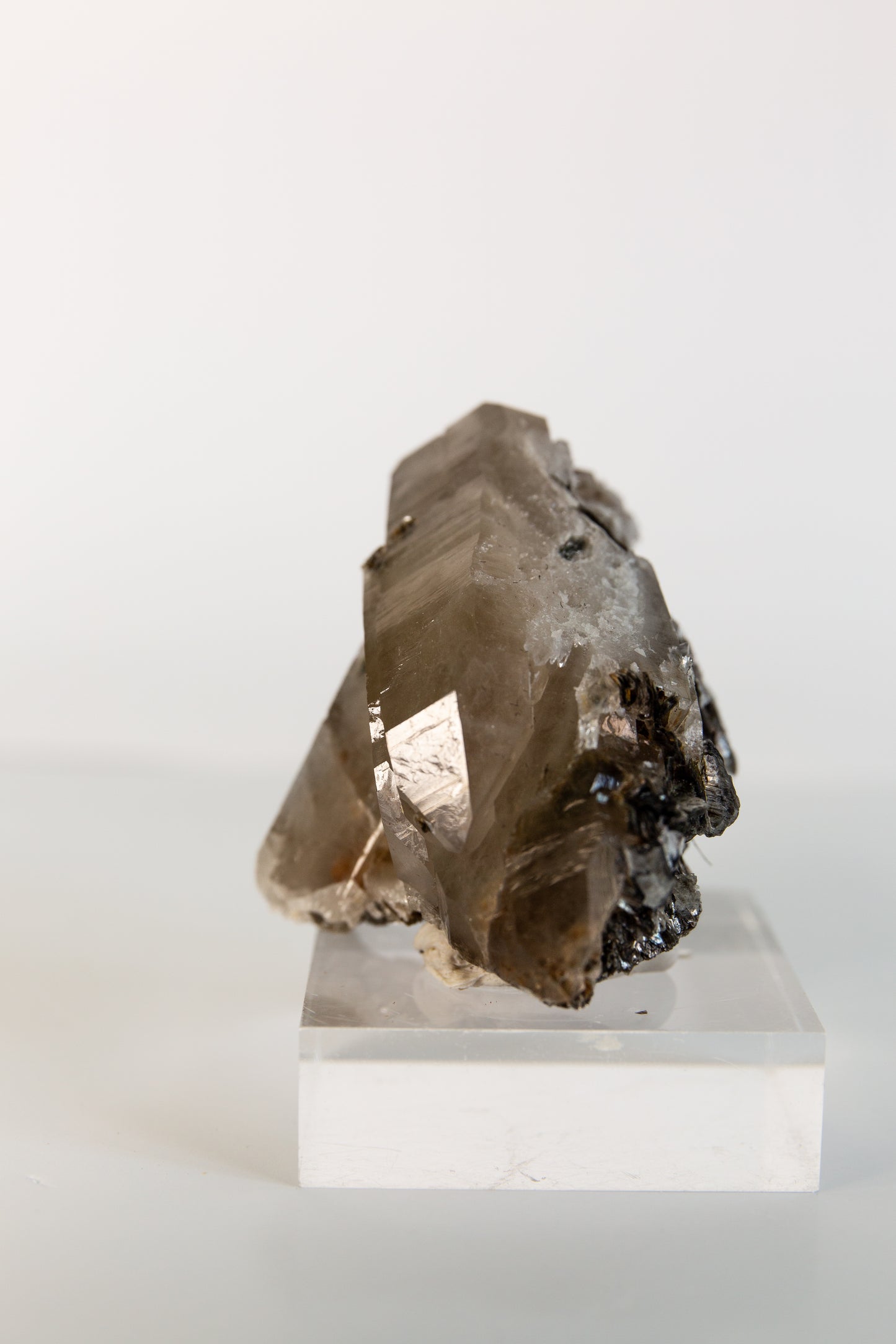 Hand dug Australian double terminated smoky with muscovite